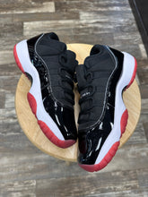 Load image into Gallery viewer, Jordan 11 Low Bred (7Y/8.5W)

